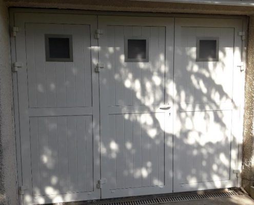 Les Menuisiers Girondins - chantier à Pessac : Changement d'une porte de garage.